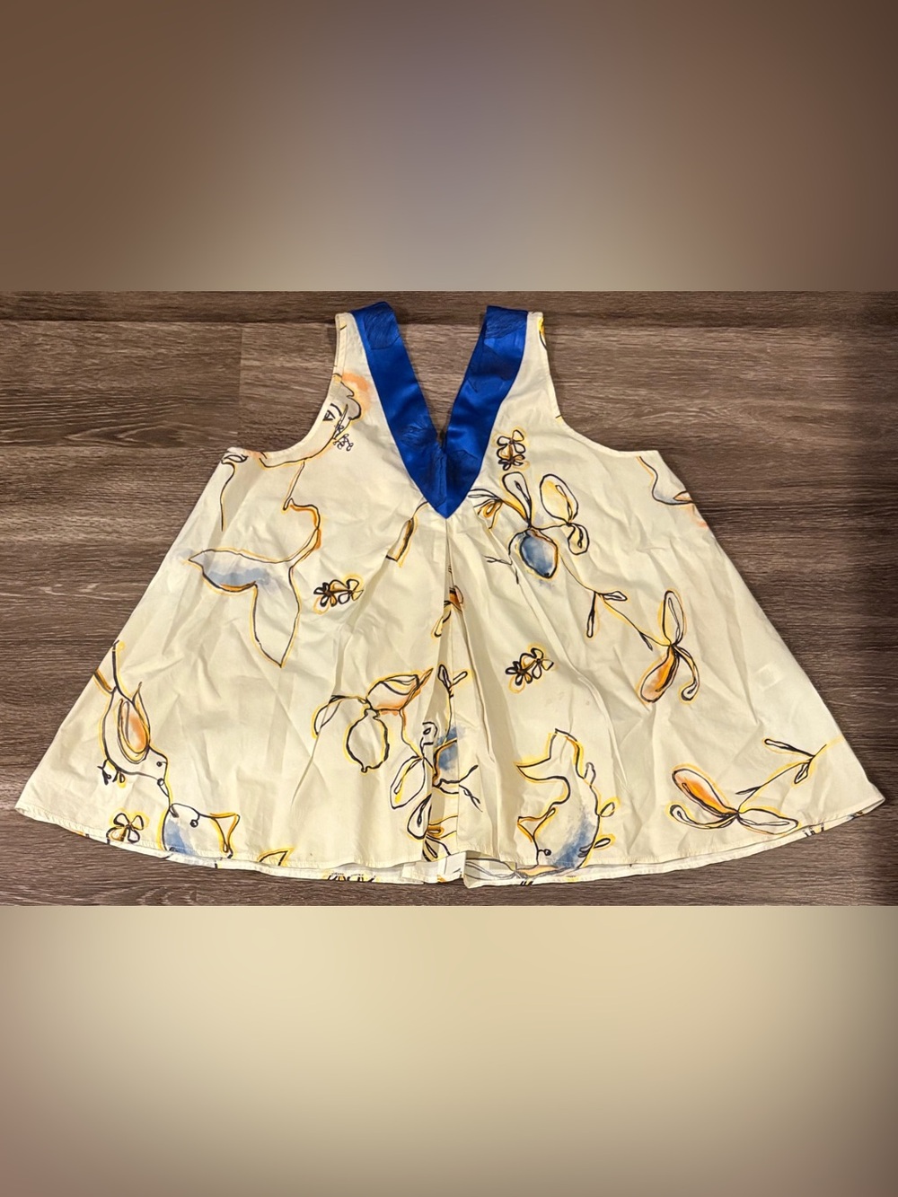 Forte Forte printed top featuring an abstract floral pattern Size 1 which is a 4